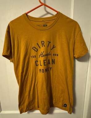 Troll Co. Dirty Hands Clean Money Graphic T-Shirt Mustard Yellow Medium